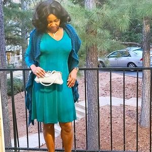 Dress in Teal color.